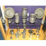 A quantity of antique and later pewter, to include jug, plates, wine goblets, tankards,