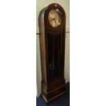 An oak cased longcase clock by Bravingtons Ltd Kings Cross & Ludgate Hill London Circa 1930's,