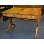 A Regency rosewood and satinwood inlaid sofa table,