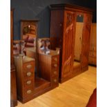 A late Victorian stained mahogany wardrobe with matching dressing chest,
