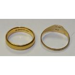 A 22ct gold wedding band, stamped 22, ring size L, 5.2g, together with a 9ct gold signet ring, 1.
