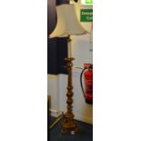 A Louis XVI style gilt gesso floor lamp, converted to electricity,
