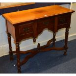 A reproduction mahogany side cabinet in the Victorian style,