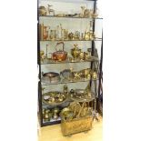 A large quantity of brass and copper wares, to include bed warming pans, chargers,