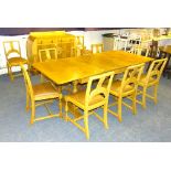 An oak dining room suite circa 1930's, comprising of sideboard, dining table and eight chairs,