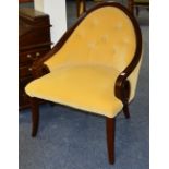 A good quality reproduction mahogany armchair with scroll frame,