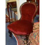 A Victorian mahogany framed lady's spoon back parlour armchair,