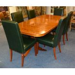 A reproduction yew wood dining table, with additional leaf, 76cm high x 217cm long x 100cm wide,