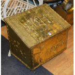 A brass log box, with hinged lid decorated with raised panels of figures and horses,