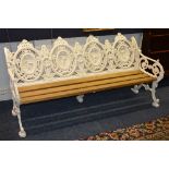 A white painted cast iron bench designed by McCauly Wade in the Soares design for Coalbrookdale,