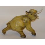 An Italian painted earthenware figure of an Elephant,