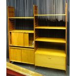 A Staples Ladderax teak two section shelving unit,