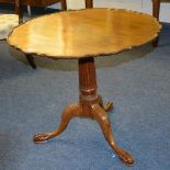 A Georgian mahogany snap top supper table,