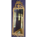 An antique giltwood and gesso wall mirror,