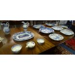 A large quantity of Victorian pottery, to include Willow pattern serving platters,