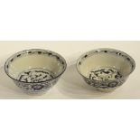 Two Chinese Ming style blue and white bowls, decorated with floral panels,