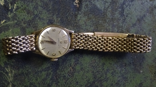 A 9ct gold lady's Omega wristwatch circa 1960s, the silvered dial with baton and Arabic numerals, - Image 3 of 4