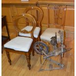 A pair of Victorian mahogany balloon back dining chairs, with drop in seats,