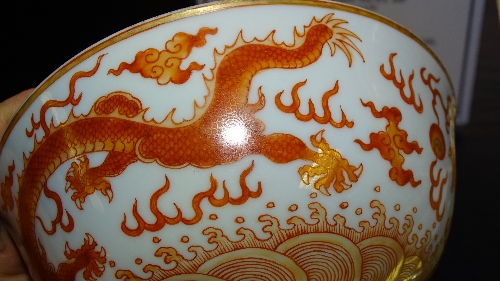 A Chinese dragon decorated bowl, with orange coloured panels and blue reign marks to underside, - Image 7 of 7