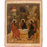 A LARGE RUSSIAN ICON OF THE HOLY TRINITY, CENTRAL RUSSIA, MID-16TH CENTURYEgg tempera and gesso on
