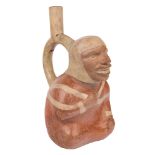 A PRE-COLUMBIAN MOCHE-STYLE FIGURAL VASE OF A SITTING MAN, PERU, C. 400 ADpolychrome-painted Moche