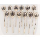 SET OF 12 SILVER AND NIELLO SPOONS WITH SCENES OF MOSCOW KREMLIN12 silver spoons with gilded bowls