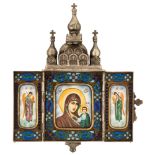 A TRAVEL TRIPTYCH OF MARY AS THE QUEEN OF HEAVEN IN A SILVER ?ASE SHAPED AS A CHURCH, MARKED TI,