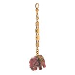 A FABERGE JEWELED AND GOLD-MOUNTED RHODONITE ELEPHANT FOB, MOSCOW, CIRCA 1900a rhodonite carved