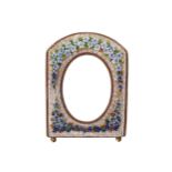 NINETEENTH-CENTURY FRENCH ENAMELLED AND BRASS PHOTO FRAMEThe oval appature with an arched top within