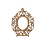 NINETEENTH-CENTURY GILT BRASS PHOTO FRAMEthe oval picture aperture within a pierced foliate