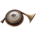 ANEROID BAROMETER enclosed in a brass hunting horn11 x 20 cm.