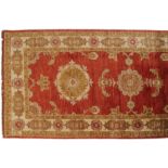 NORTH WEST PERSIAN RUNNERon red ground, with ivory border380 x 85 cm.