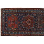 NORTH WEST PERSIAN HERIZ RUNNERon blue ground, with turquoise and red border386 x 105 cm.