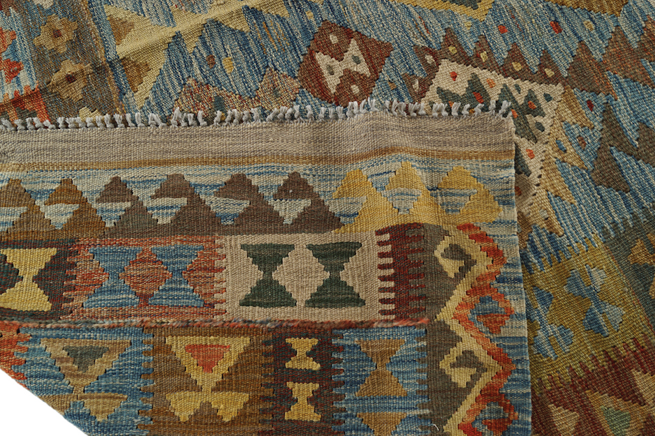 NORTHEAST PERSIAN KELIM VEG DYE CARPET on turquoise ground, with repeated diamond medallions, and - Image 6 of 6