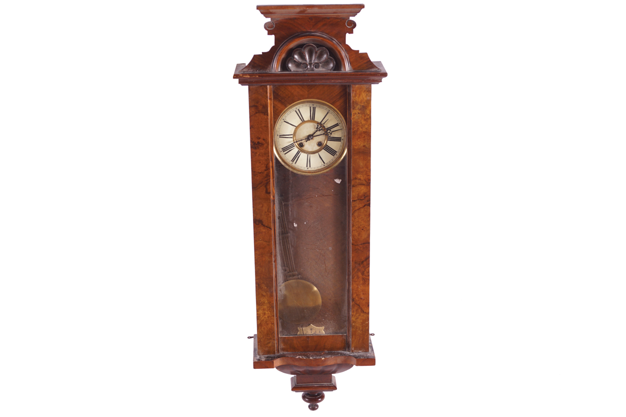 NINETEENTH-CENTURY VIENNA WALL CLOCK enclosed in a walnut frame 118 x 38 cm.