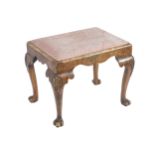 EDWARDIAN PERIOD WALNUT STOOL The rectangular upholstered drop-in seat, above a conforming apron,