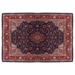 HANDMADE NORTHWEST PERSIAN CARPET on blue ground, with red border, and ivory cartouches 318 x 249