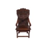 SEVENTEENTH-CENTURY PERIOD CARVED OAK WAINSCOT CHAIR, CIRCA 1680 the low relief carved panelled