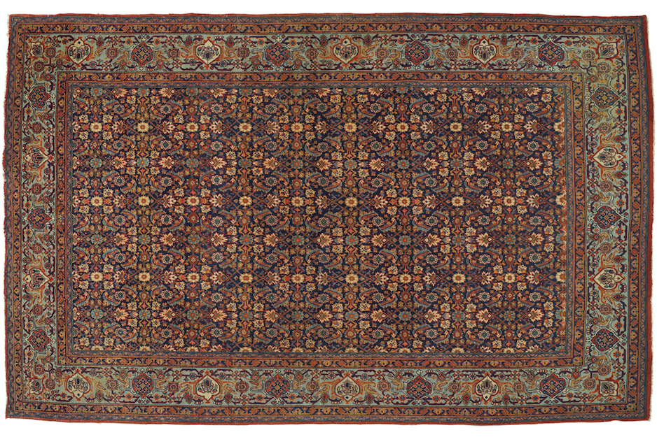 ANTIQUE TABRIZ RUG with all over design, on blue ground,with turquoise border and script border