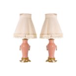 PAIR OF ORMOLU AND PORCELAIN VASE STEMMED TABLE LAMPS and shades 40 cm. high; 16 cm. diameter (2)