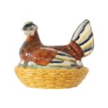 NINETEENTH-CENTURY CERAMIC HEN ON NEST 20 cm. high; 23 cm. wide; 14 cm. deep