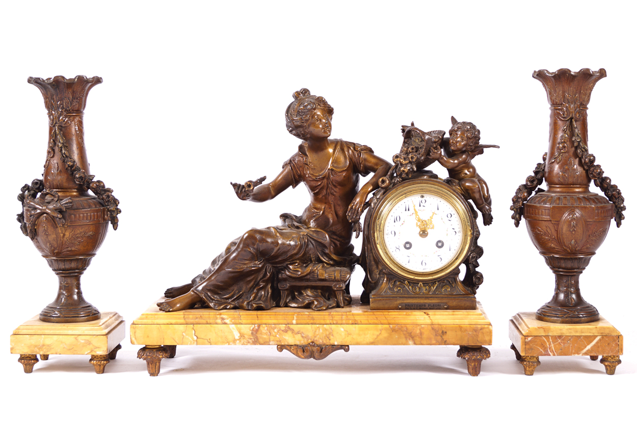 NINETEENTH-CENTURY FRENCH CLOCK GARNITURE Comprising: a figure mounted clock by Moreau of Paris