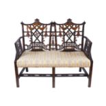 NINETEENTH-CENTURY PERIOD EBONY AND PARCEL GILT CHINESE CHIPPENDALE SETTEE the double panelled back,