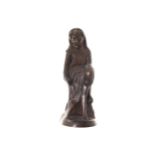 TWENTIETH-CENTURY BRONZE FIGURE Young girl seated on a tree trunk 44 cm. high