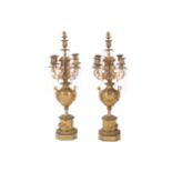 PAIR OF NINETEENTH-CENTURY ORMOLU CANDELABRA each of four scroll arms, each raised on a caryatid