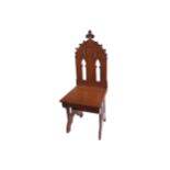 DUBLIN LATE NINETEENTH-CENTURY GOTHIC REVIVAL OAK CHAIR CIRCA 1870 the pierced arched back, below