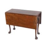 GEORGE II PERIOD MAHOGANY GATE LEG TABLE The rectangular shaped top with square drop leafs, raised