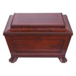 IMPORTANT REGENCY PERIOD MAHOGANY AND EBONY STRING INLAID WINE COOLER of sarcophagus form, the