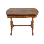 NINETEENTH-CENTURY WALNUT-CARD TABLE The rectangular serpentine shaped top, opening to a baize lined