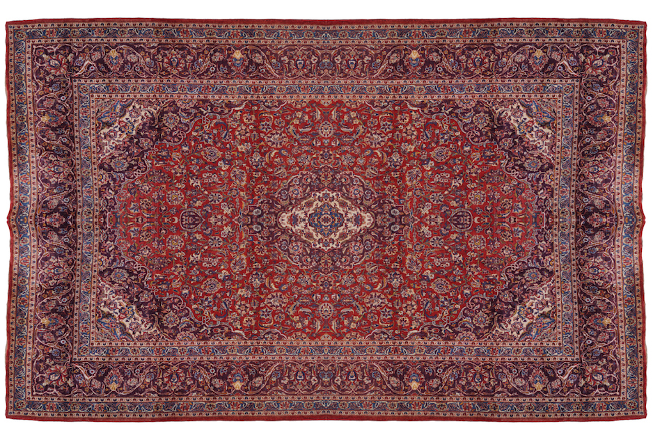 LARGE MID TWENTIETH-CENTURY WEST PERSIAN KASHAN CARPET on red ground, with ivory and blue